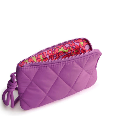 Vera Bradley Iris Orchid zip wristlet with floral print, wrist strap, and card slip pockets for compact organization.

