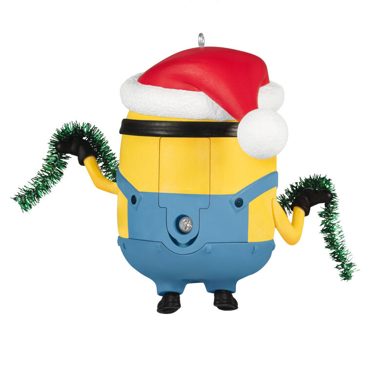 Minion Bob ornament in Santa hat holding green tinsel garland with a big smile