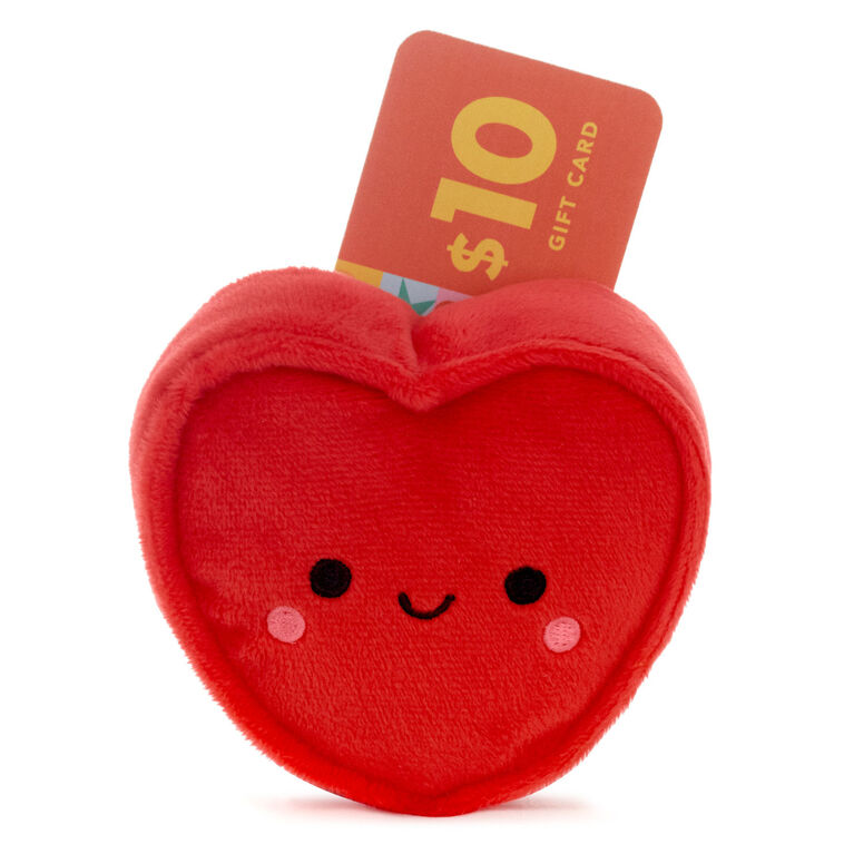 Red plush heart gift card holder with smiling face, blushing cheeks, and a pocket on the back for cash or cards.

