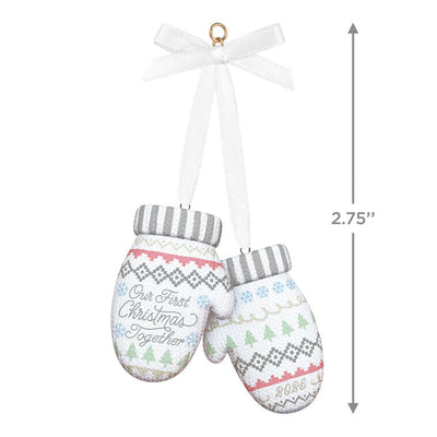 Porcelain Christmas ornament with pair of colorful knit mittens and “Our First Christmas Together 2025” message

