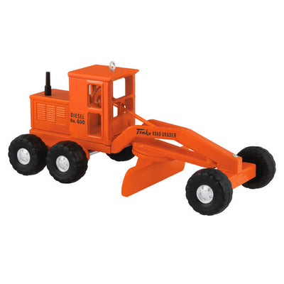 Hallmark Keepsake Hasbro Tonka Road Grader ornament, orange die-cast metal construction vehicle toy with turning wheels, vintage-style design.