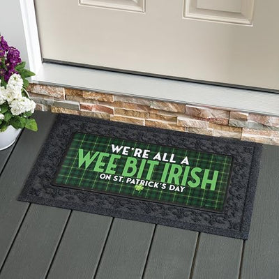 Evergreen Sassafras Mat with "Wee Bit Irish" text and festive clovers; durable, anti-skid, and weather-resistant for indoor or outdoor use.