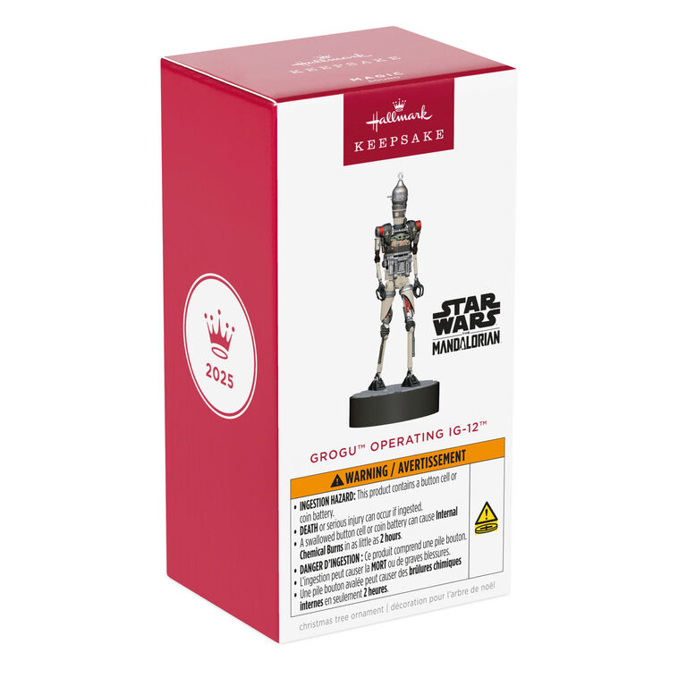 Ornament of Grogu piloting IG-12 droid from Star Wars: The Mandalorian™, on round base with sound button for “Yes” and “No” phrases.