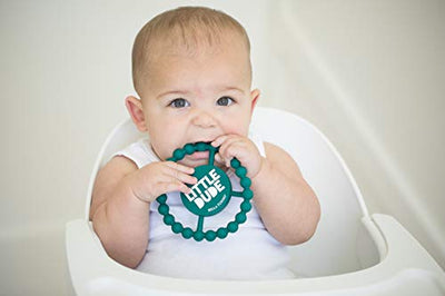 Round silicone baby teether with "Little Dude" printed on it, textured for teething relief, and easy for small hands to grip.