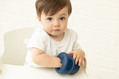Bella Tunno Pirate Happy Snacker in navy blue, spill-proof silicone snack cup with easy-grip handles .