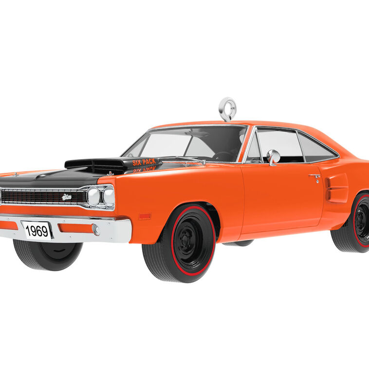 1969 Dodge Super Bee die-cast metal ornament in orange with black racing stripes, redline tires, and turning wheels.