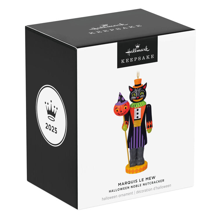 Black cat nutcracker ornament dressed as nobleman with top hat, colorful coat, and pumpkin staff on harlequin base