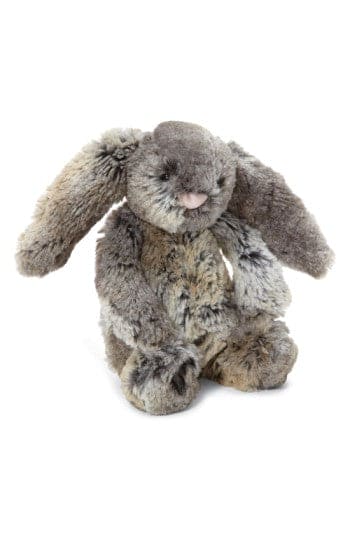 Brown and white stuffed rabbit with long ears