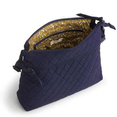 Vera Bradley Original Zip Hipster in Peacoat navy, crossbody bag with three zippered compartments, adjustable strap, and slim, stylish profile for hands-free use.

