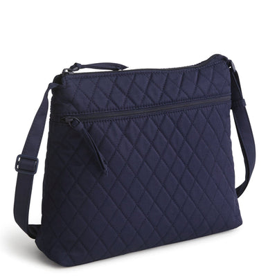 Vera Bradley Original Zip Hipster in Peacoat navy, crossbody bag with three zippered compartments, adjustable strap, and slim, stylish profile for hands-free use.