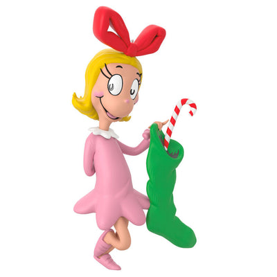 Hallmark Keepsake Dr. Seuss Cindy-Lou Who ornament, in pink nightgown, holding green stocking and candy cane, inspired by How the Grinch Stole Christmas.