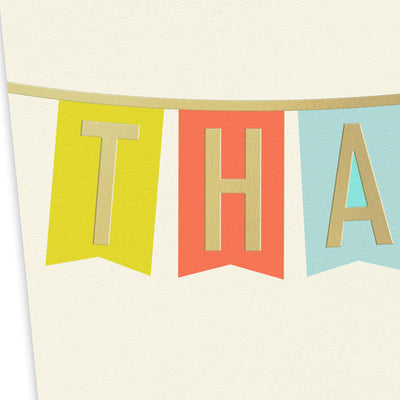 Thank-you cards with colorful pennant banner letters and gold foil on an off-white background.
