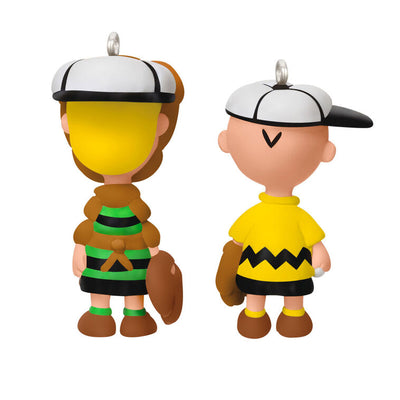 Set of two mini ornaments: Charlie Brown in baseball hat and glove, Schroeder in catcher’s gear, Hallmark Peanuts Christmas collectibles
