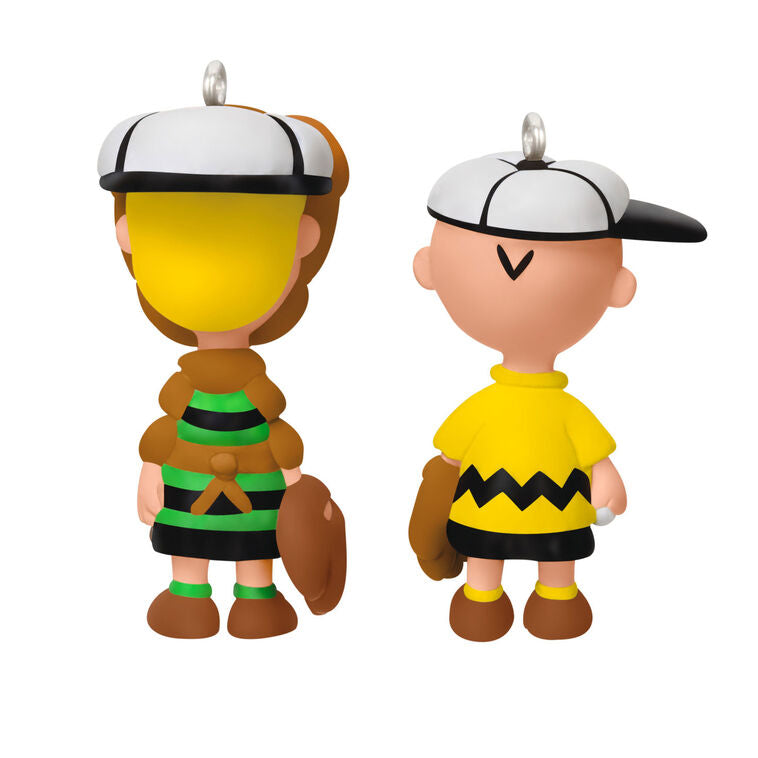 Set of two mini ornaments: Charlie Brown in baseball hat and glove, Schroeder in catcher’s gear, Hallmark Peanuts Christmas collectibles
