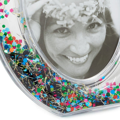 Clear oval picture frame with colorful metallic confetti inside the border, easel back, fits 4x6 vertical photo, Hallmark
