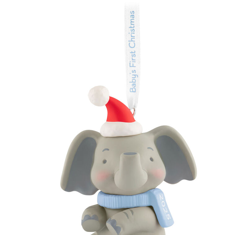 Gray elephant ornament with Santa hat and pink scarf, holding a 2025 baby girl’s first Christmas ribbon.