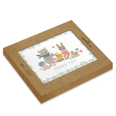 Baby thank you cards with bear and bunny picnic illustration framed by greenery, includes 10 blank white cards and kraft envelopes