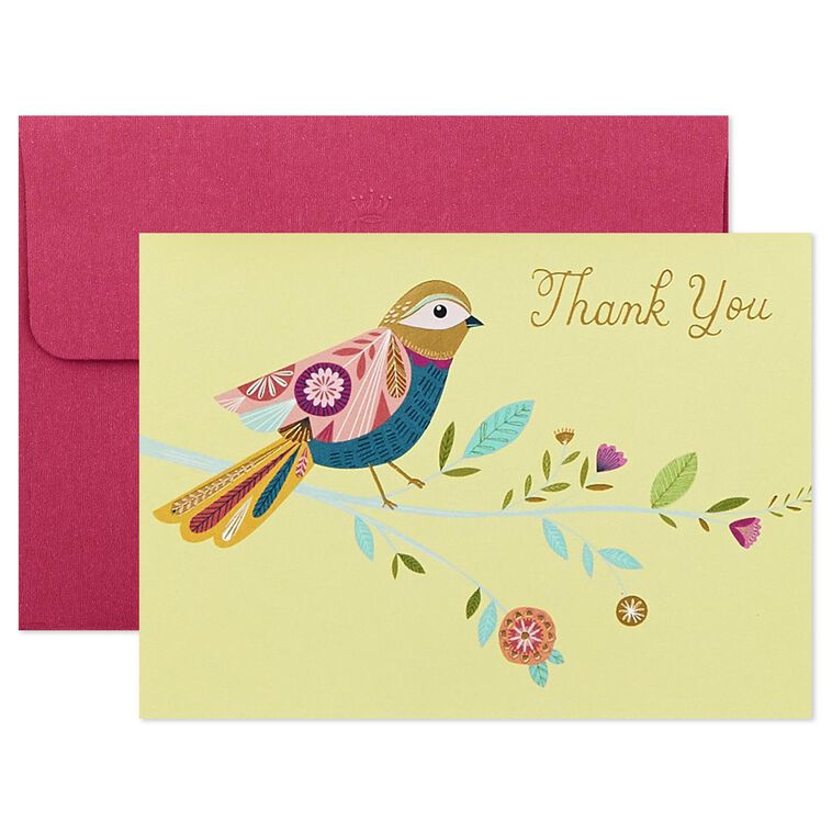 Assorted whimsical note cards with gold foil accents in multiple designs, includes envelopes and reusable caddy.
