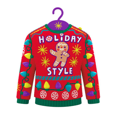 Red and green Christmas sweater ornament with gingerbread man, candy, and lights, plays "Carol of the Bells."

