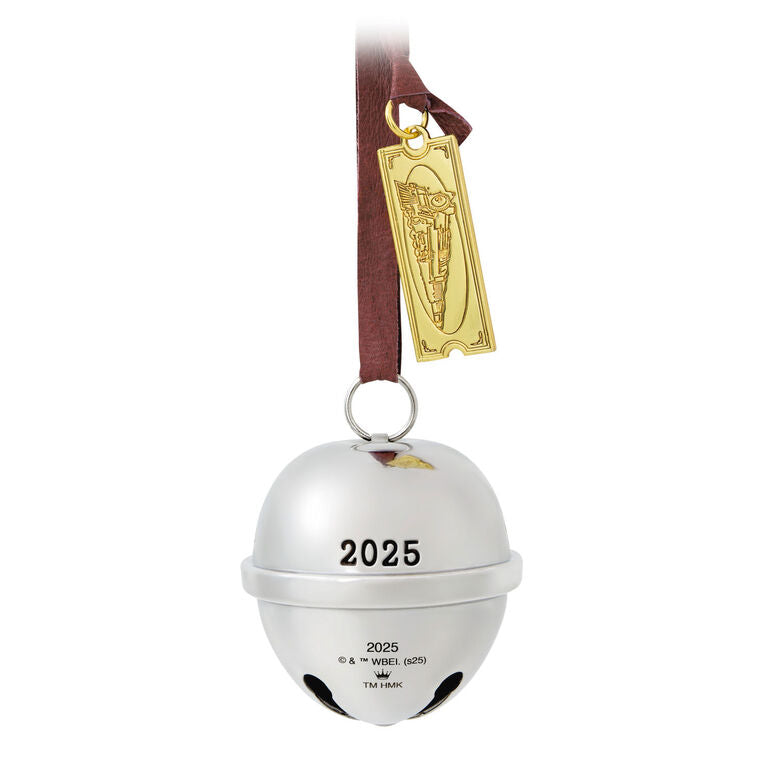 Shiny metal sleigh bell Christmas ornament from The Polar Express with gold ticket tag, faux leather hanger, and commemorative 2025 date.