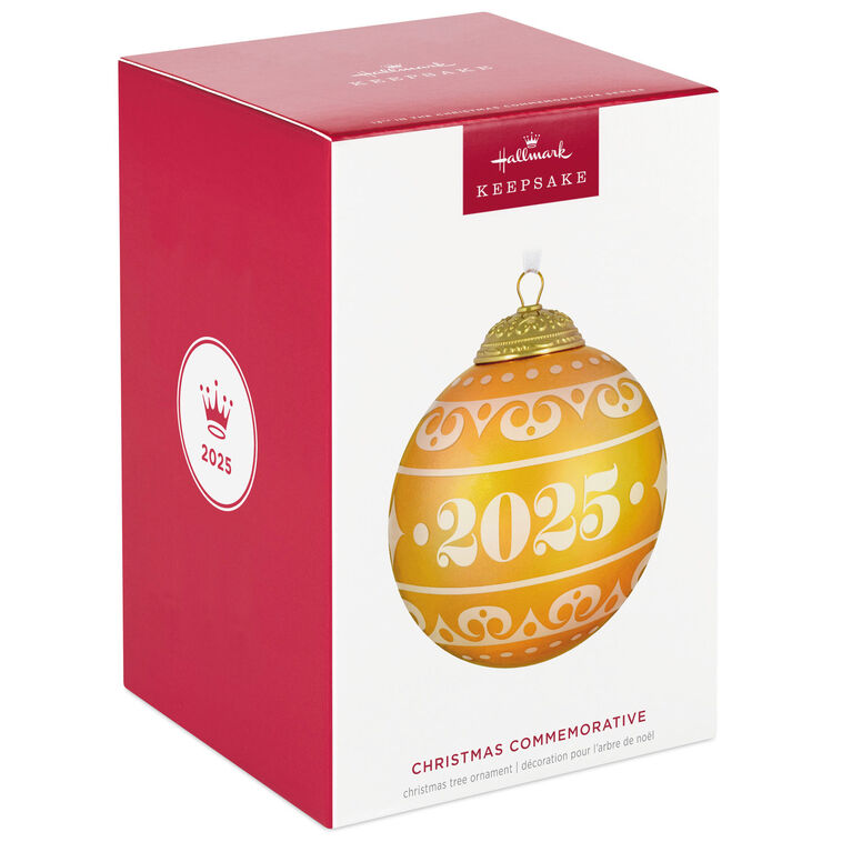 Hallmark Keepsake Christmas Commemorative 2025 ornament—yellow frosted glass ball with elegant gold scroll design, embossed metal cap, and “2025