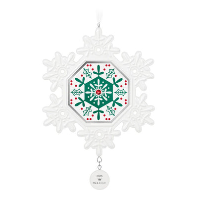 Elegant white porcelain snowflake ornament with red and green accents and red gemstone for 2025