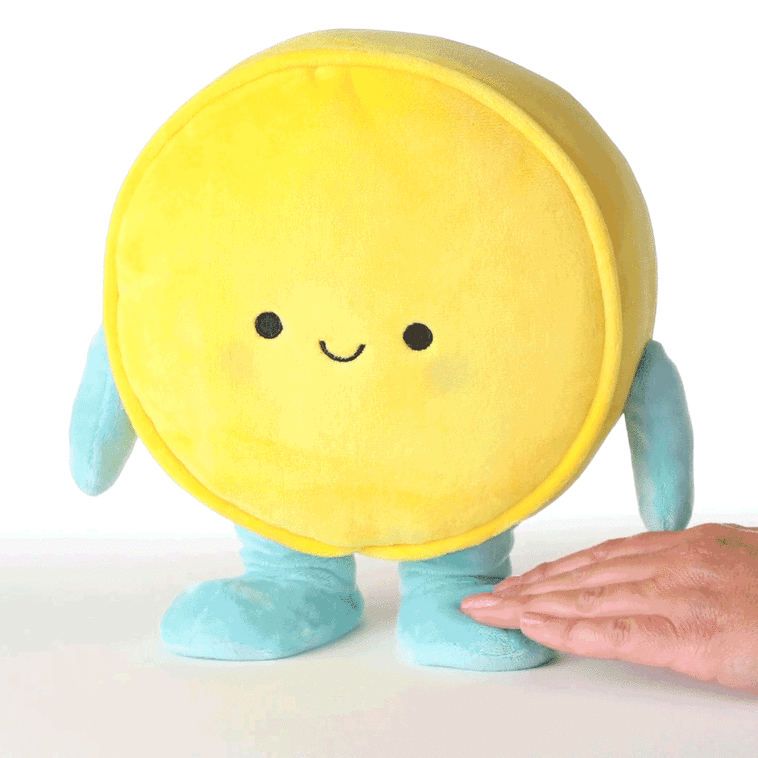 Round yellow smiley face plush toy with blue arms and legs, dancing and singing &