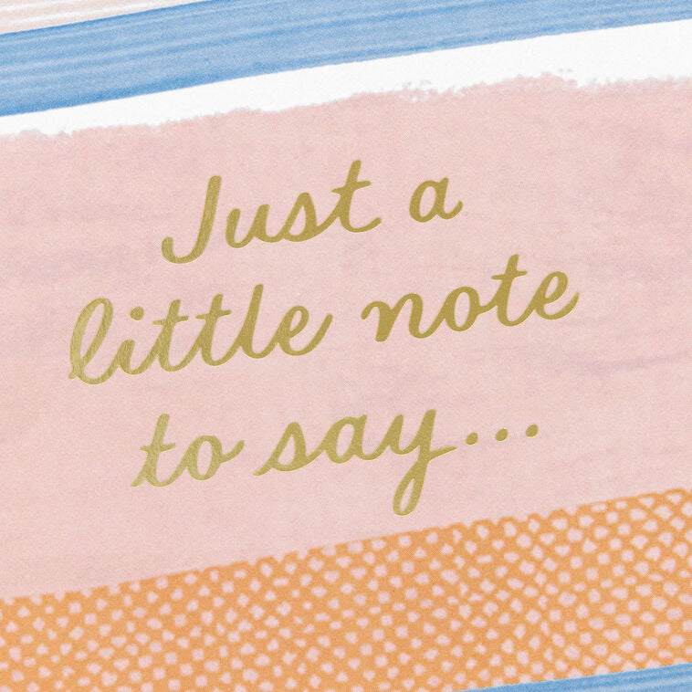 Note cards with pink, blue, and orange brushstroke stripes and gold script reading “Just a little note to say…”, boxed with envelopes.

