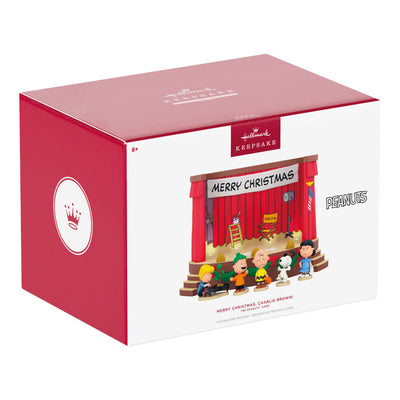 Peanuts tabletop Christmas decoration featuring Charlie Brown and friends on stage with lights and sound effects from A Charlie
