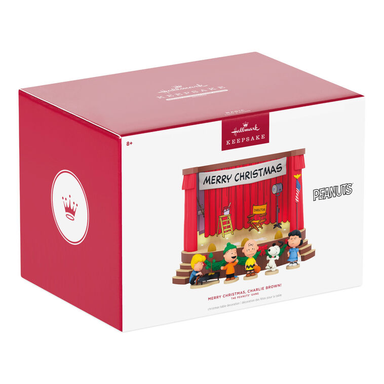 Peanuts tabletop Christmas decoration featuring Charlie Brown and friends on stage with lights and sound effects from A Charlie
