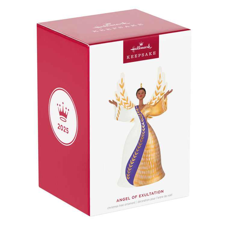 Angel ornament in gold, white, and purple gown with raised hands and detailed wings, a radiant Hallmark Keepsake holiday symbol of faith.