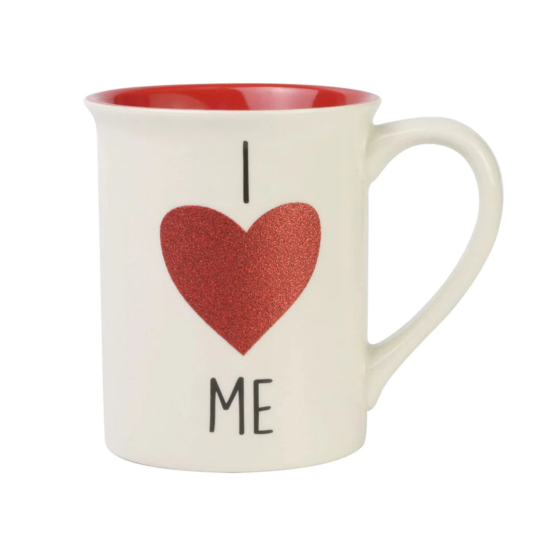 "I Heart Me" glitter mug by Our Name is Mud with sparkly design, promoting self-love and positivity with every sip.
