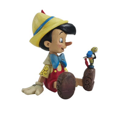Pinocchio & Jiminy Sitting Disney Traditions