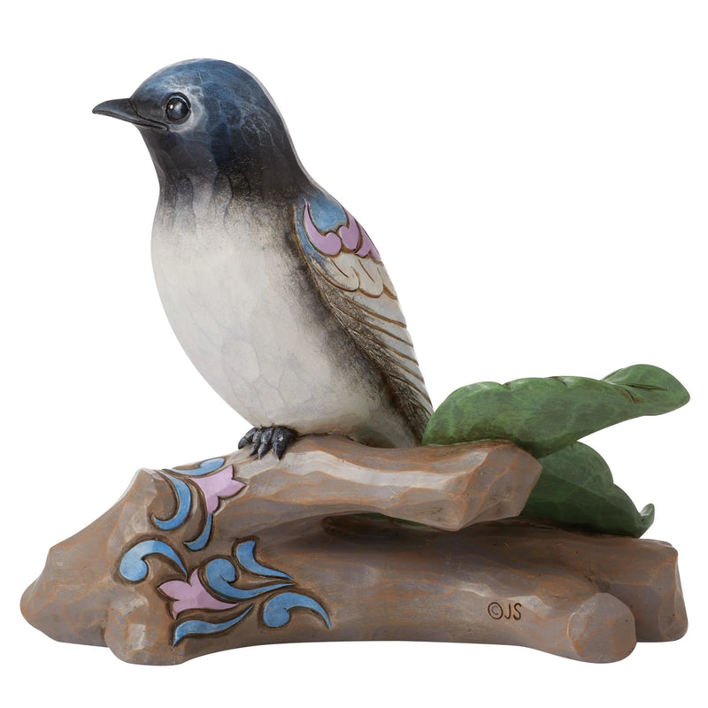 Jim Shore Purple Martin bird figurine with rosemaling, perched on a tree branch.
Character count: 98 — includes visual details and keywords like “Jim Shore,” “Purple Martin,” and “figurine.”


