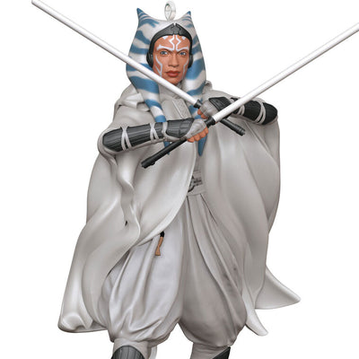 Ahsoka Tano ornament in gray cloak with dual white lightsabers drawn, posed for battle as seen in Star Wars: Ahsoka.