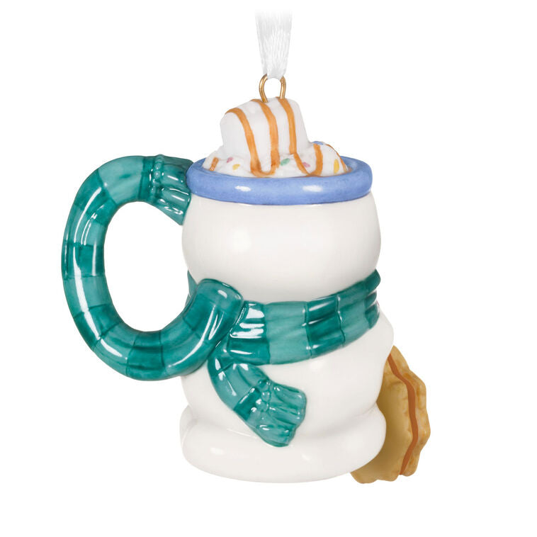Porcelain ornament shaped like a snowman mug with scarf, pink mittens, marshmallow, caramel drizzle, and snowflake cookie, Hallmark Cup of Cozy series