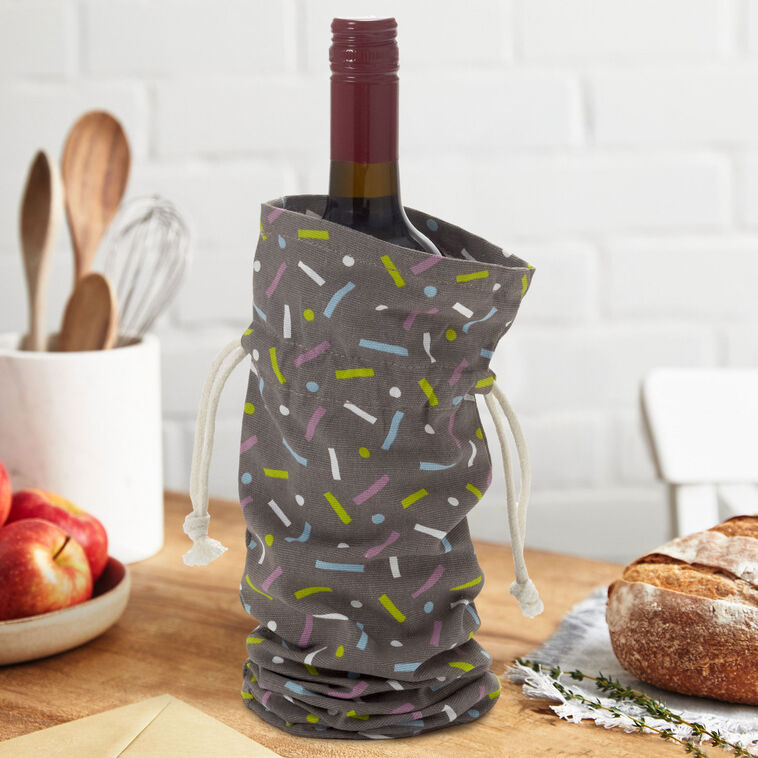 Hallmark 14-inch black fabric wine gift bag with colorful confetti print and drawstring
