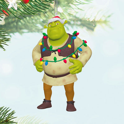 Shrek ornament with Santa hat and tangled Christmas lights around his chest and arms