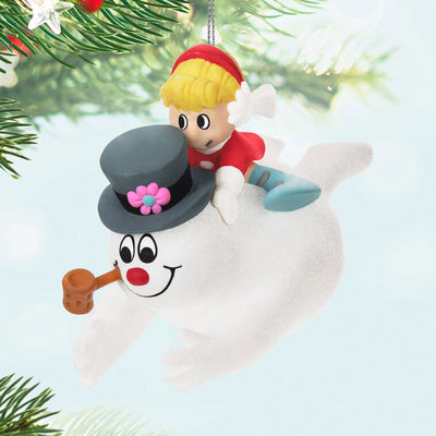 Frosty the Snowman ornament by Hallmark Keepsake featuring Frosty sliding down a snowy hill with Karen on his back from the classic holiday special.