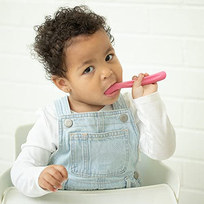 Set of two baby spoons in Eat Cake and Hail Queen colors, made of soft, teething-friendly silicone.

