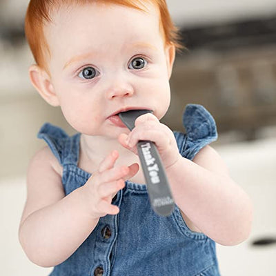 Silicone baby spoon set in Thank You and Please designs, soft and teething-safe with ergonomic grips for easy self-feeding.

