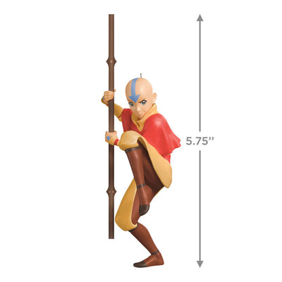 Christmas ornament of Aang from Avatar: The Last Airbender holding his staff in a defensive pose with arrow tattoo on forehead.