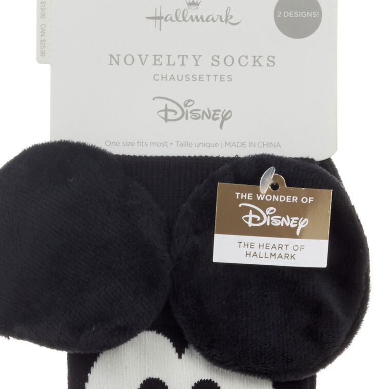 Disney Mickey and Minnie Mouse novelty socks with 3D ears and bow; mismatched crew socks make a fun gift for Disney fans.