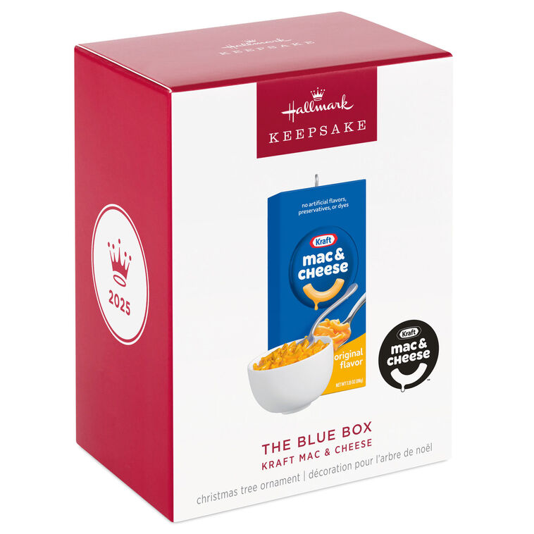 Hallmark ornament of Kraft Mac & Cheese blue box with bowl of cheesy pasta and spoon.