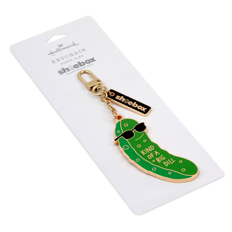 Hallmark pickle keychain with green enamel charm that says “Kind of a Big Dill” in white letters and a black accent tag.