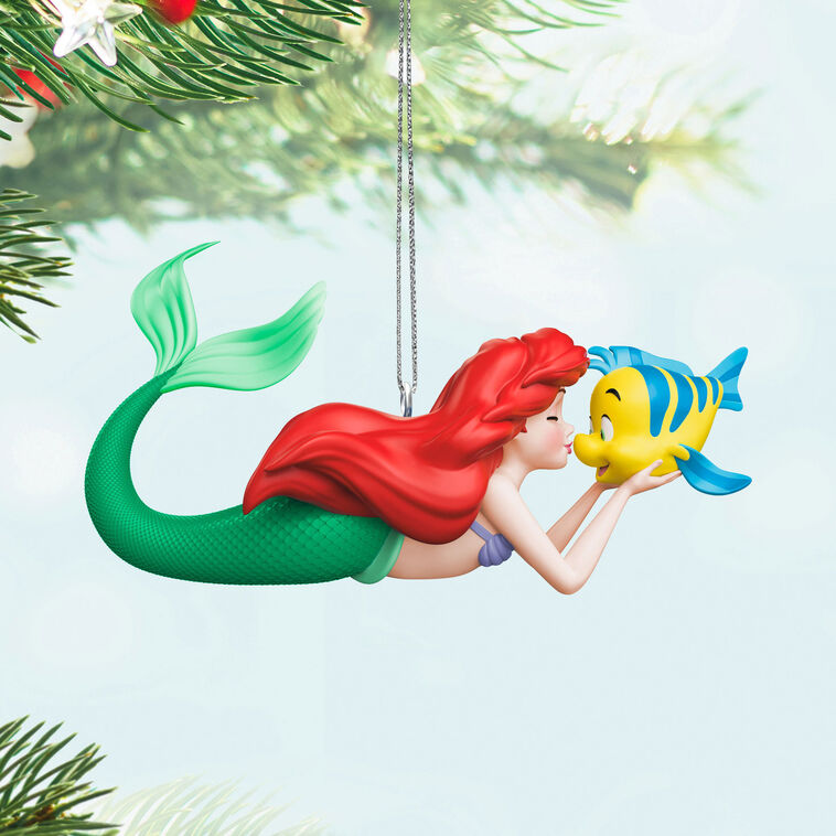 Ariel ornament from The Little Mermaid holding Flounder and giving him a kiss, with her green tail curled beside her