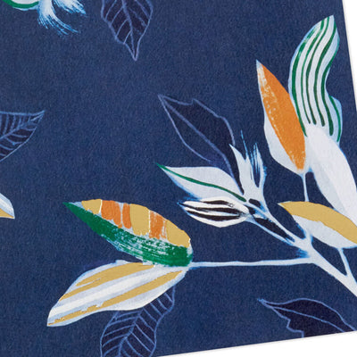 Elegant blank note cards with gold-accented tropical leaves on navy background, boxed set of 10 with white envelopes.
