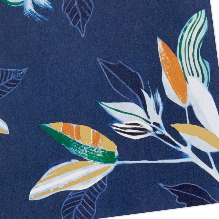 Elegant blank note cards with gold-accented tropical leaves on navy background, boxed set of 10 with white envelopes.
