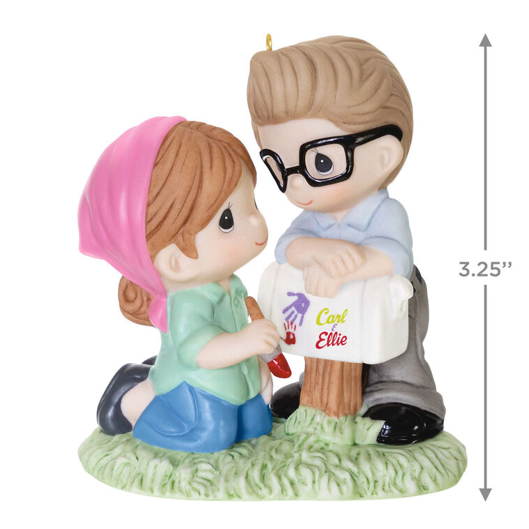 Porcelain ornament of Carl and Ellie from Disney Pixar’s Up painting a mailbox, in Precious Moments style