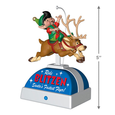 Elf riding Blitzen the reindeer musical ornament with motion, playing "William Tell Overture" holiday keepsake.


